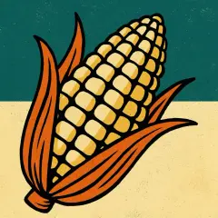 Ein Maiskolben mit orangefarbenen Blättern vor einem zweigeteilten Hintergrund. Symbol für Agrar-ETF und Ernte.